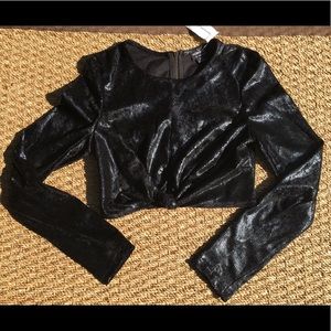 Black long sleeved crop top.